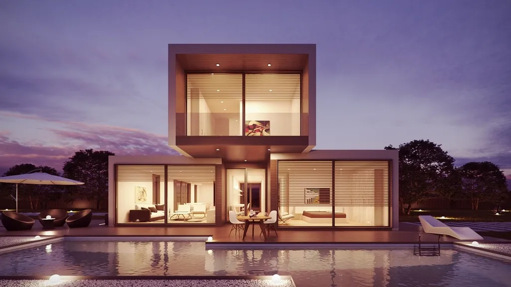 A house with its lights on at dusk